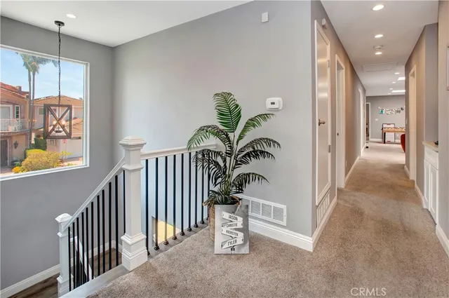 a view of entryway and hall with a window