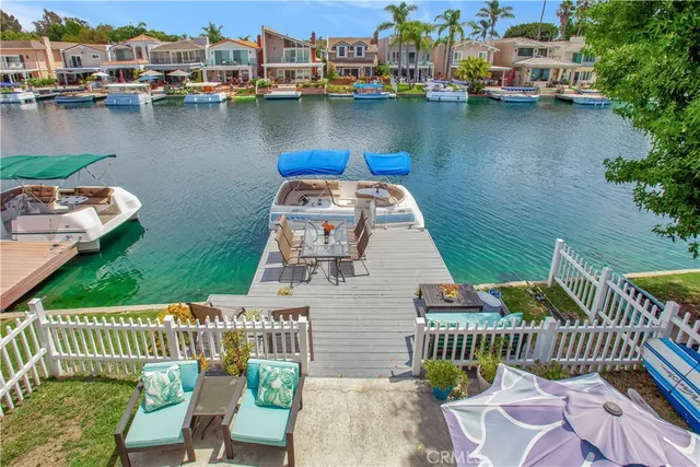 an aerial view of a deck and lake view