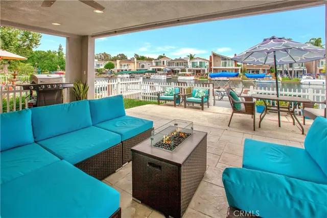 a view of a terrace with furniture and a patio