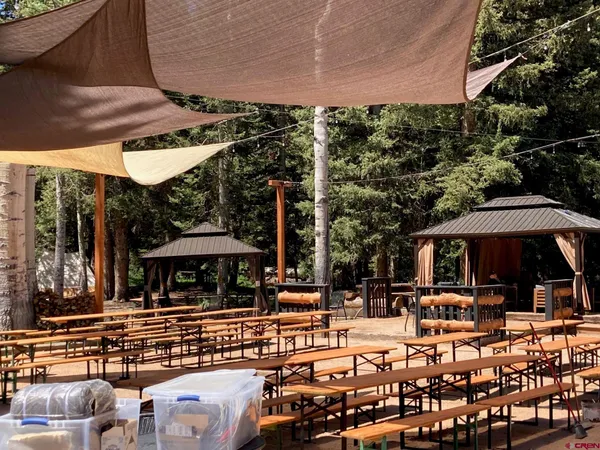 a view of a a dining room with furniture