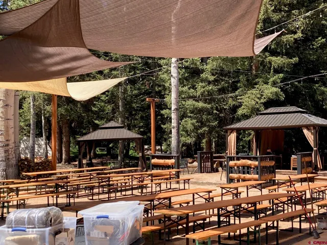 a view of a a dining room with furniture