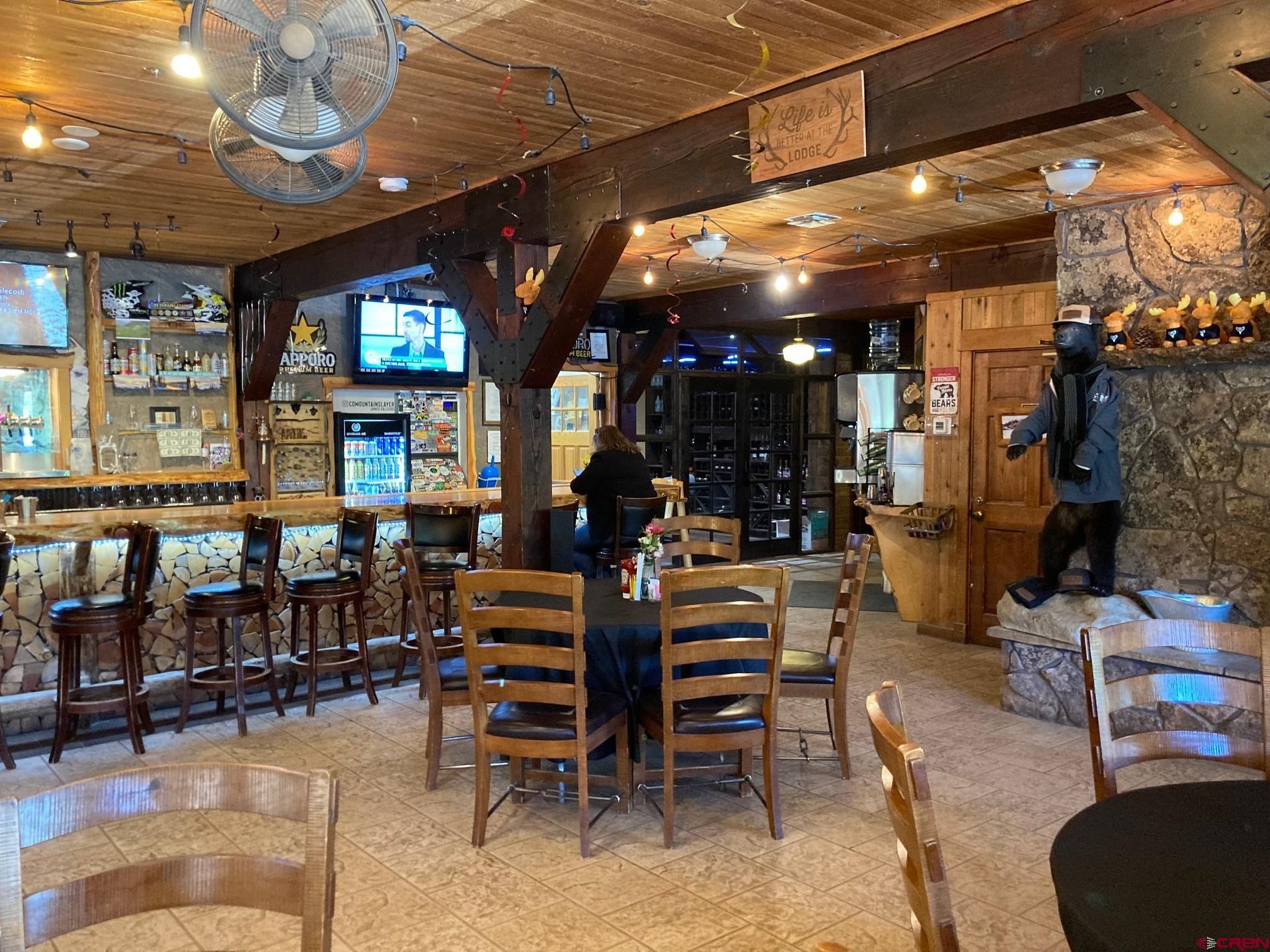 147 Ridge Road Cimarron, CO 81220 - Photo 24 of 36 a view of a a dining room with furniture