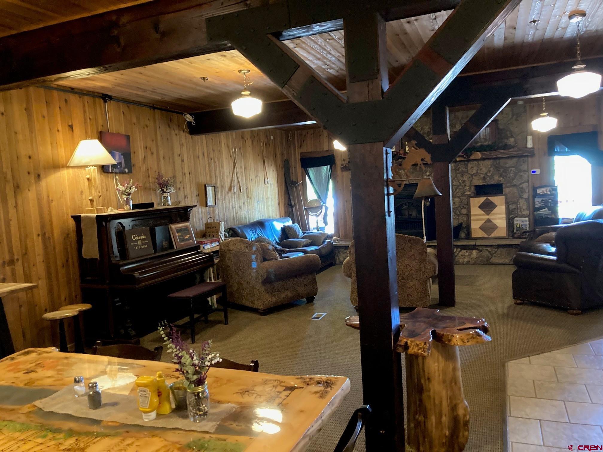 147 Ridge Road Cimarron, CO 81220 - Photo 27 of 36 a kitchen with stove and a refrigerator