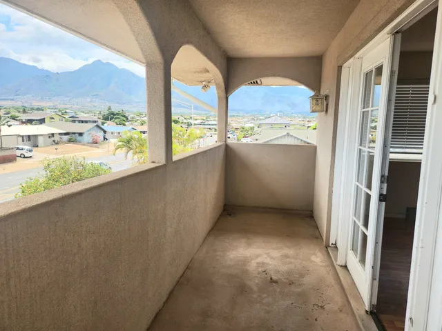 a view of walk in closet with a window