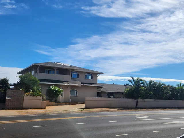 a view of a street with cars