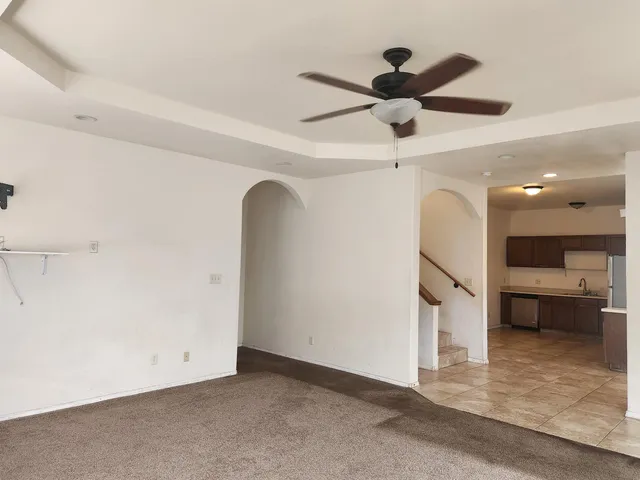 a view of a hallway with a living space