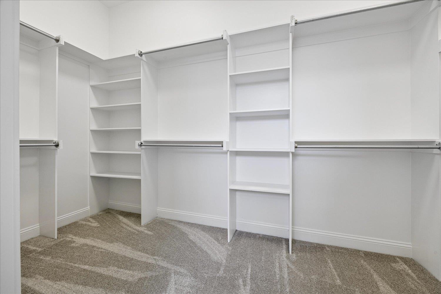 2939 Brighton-Clopton Road Brighton, TN 38011 - Photo 23 of 36 Walk in closet featuring light carpet