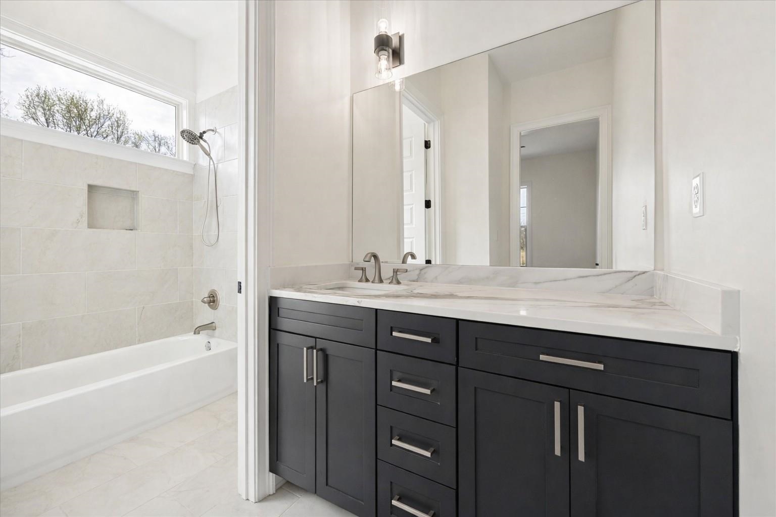 2939 Brighton-Clopton Road Brighton, TN 38011 - Photo 4 of 36 Bathroom featuring double vanity and shower / bathtub combination