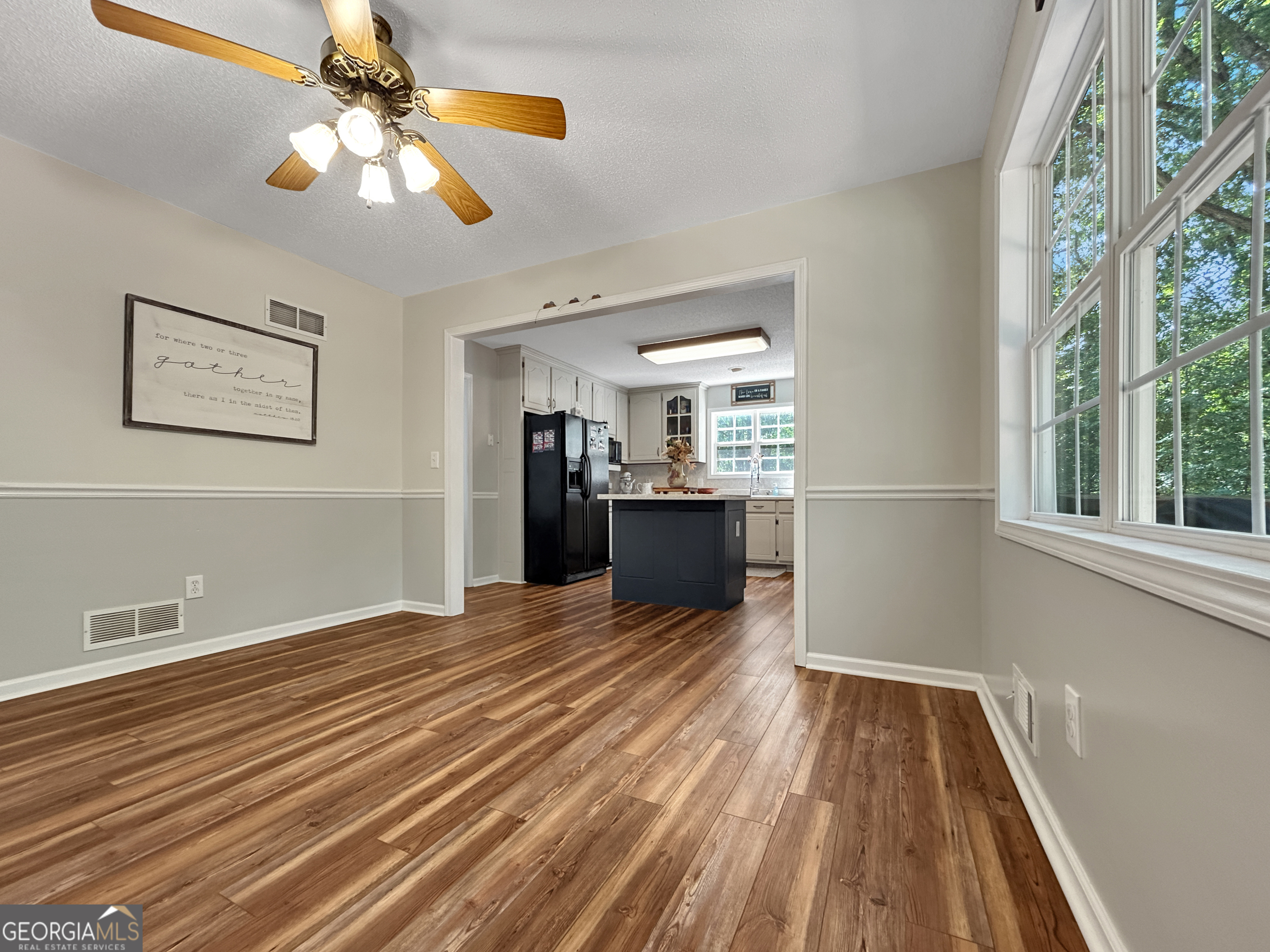 715 Frog Road Locust Grove, GA 30248 - Photo 12 of 56 wooden floor in an empty room with a window
