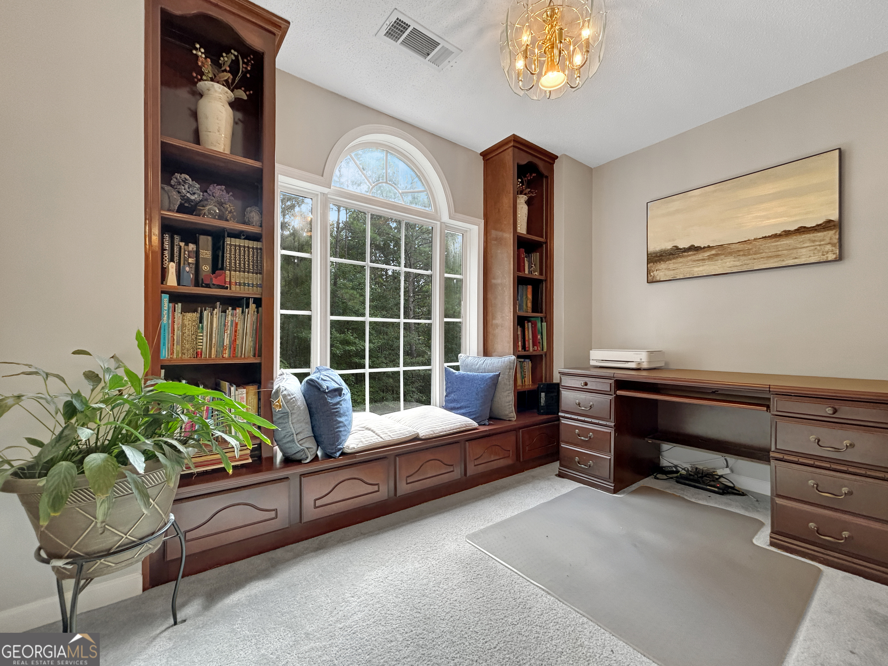 715 Frog Road Locust Grove, GA 30248 - Photo 20 of 56 a living room with furniture and a potted plant