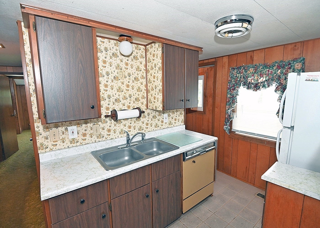 44 Great Hill Drive Wareham, MA 02576 - Photo 15 of 19 a bathroom with a sink a mirror and a window