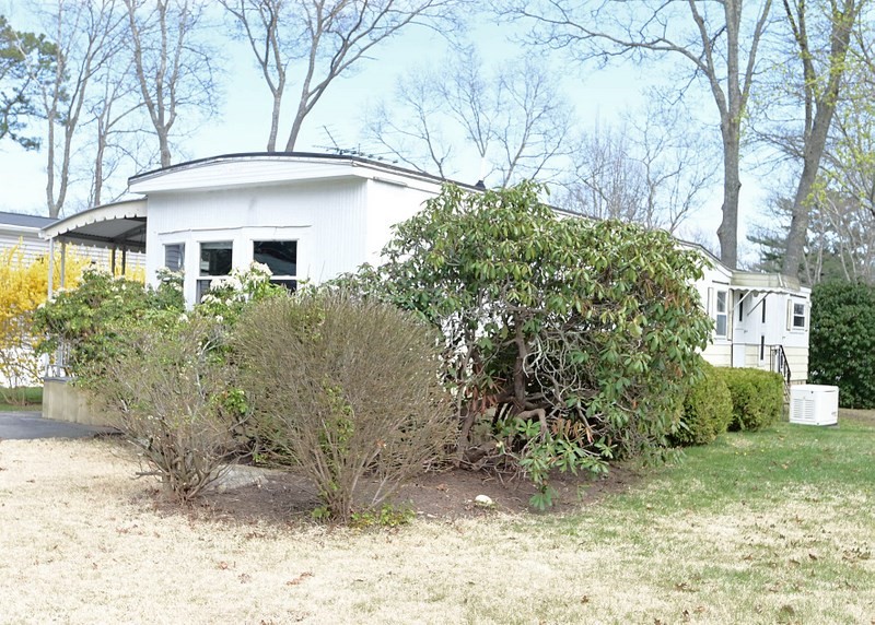 44 Great Hill Drive Wareham, MA 02576 - Photo 2 of 19 a front view of a house with garden