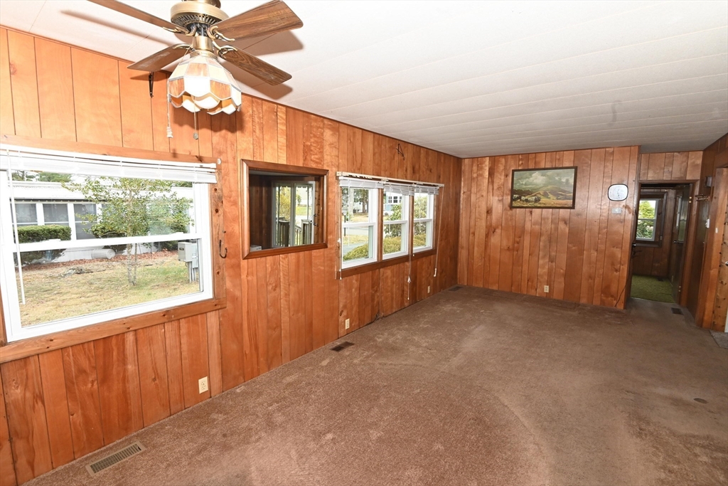 44 Great Hill Drive Wareham, MA 02576 - Photo 6 of 19 en empty room with windows
