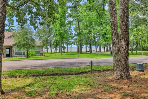 $99,900 | 90 North Royale Greens Drive, Coldspring, TX 77331