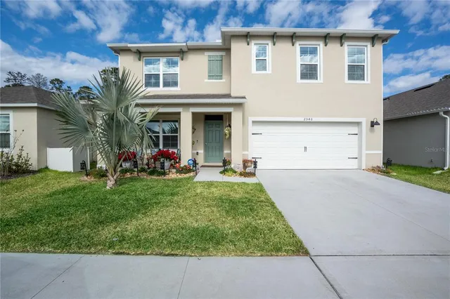 a view of outdoor space yard and front view of a house