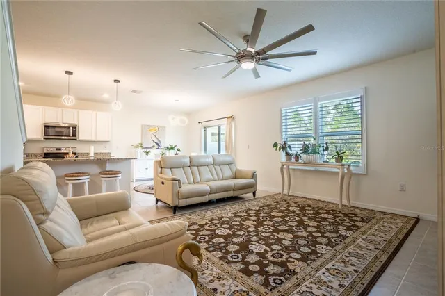 a living room with furniture and a window