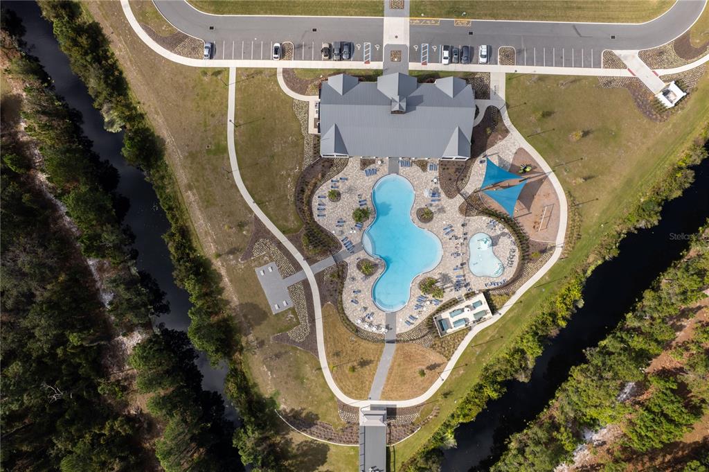 2540 Harmonia Hammock Road Harmony, FL 34773 - Photo 47 of 54 an aerial view of a swimming pool