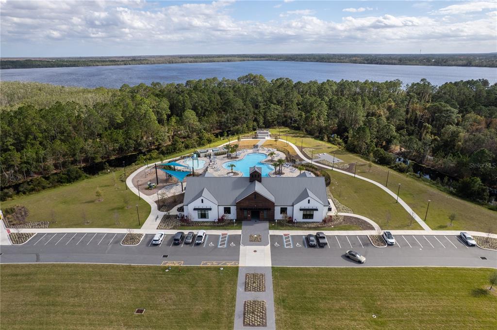 2540 Harmonia Hammock Road Harmony, FL 34773 - Photo 48 of 54 a view of a swimming pool with a yard