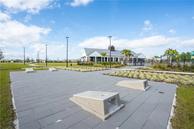 an aerial view of a house with swimming pool