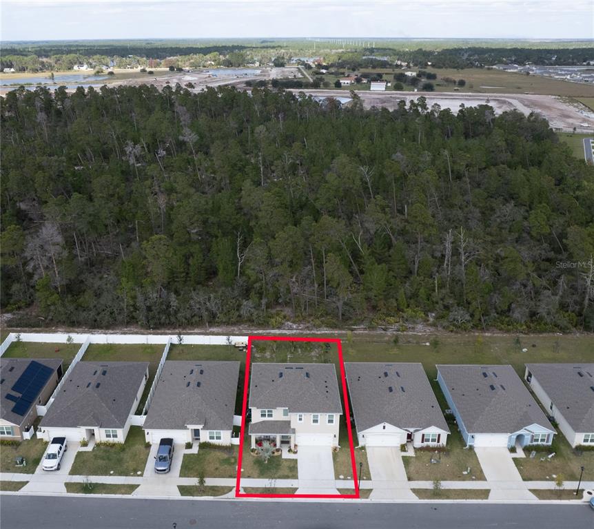 2540 Harmonia Hammock Road Harmony, FL 34773 - Photo 5 of 54 an aerial view of residential houses