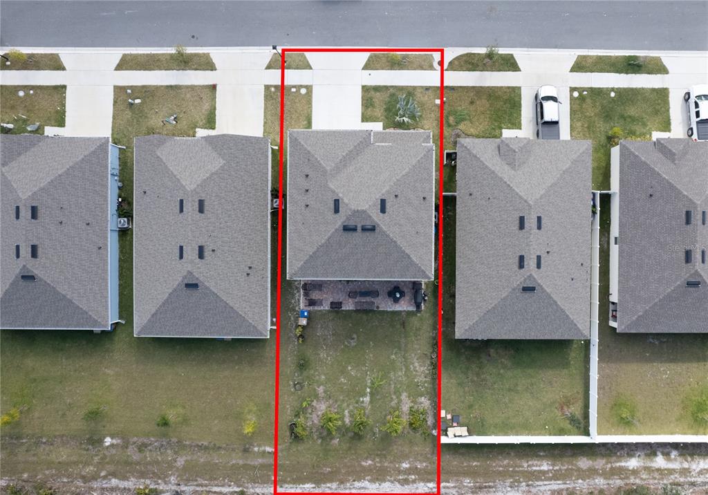 2540 Harmonia Hammock Road Harmony, FL 34773 - Photo 54 of 54 an aerial view of a house with swimming pool