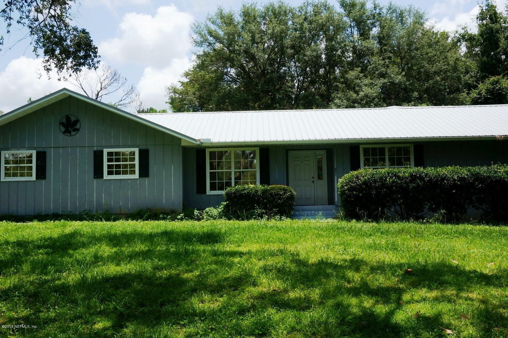 6511 Brooklyn Bay Road Keystone Heights, FL 32656 - Photo 2 of 25 a view of front of house with a yard