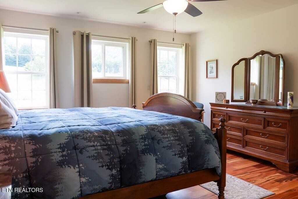 1518 Cummingsville And Sparkman Road Doyle, TN 38559 - Photo 31 of 58 a bedroom with a bed and a dresser
