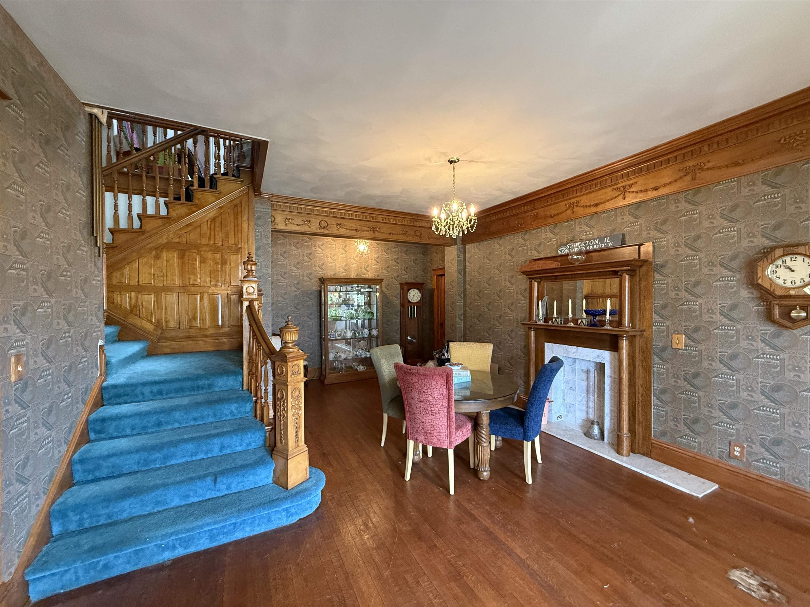 323 South Main Street Stockton, IL 61085 - Photo 5 of 32 a dining room with furniture and wooden floor