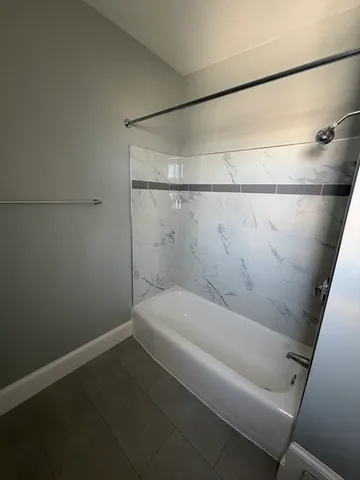 a bathroom with a bathtub