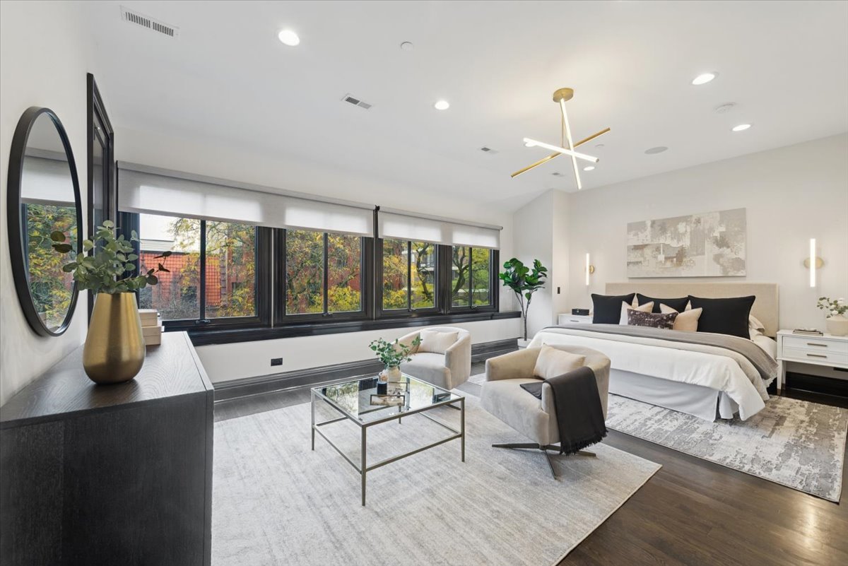 457 West Deming Place Chicago, IL 60614 - Photo 12 of 63 a living room with furniture and a large window