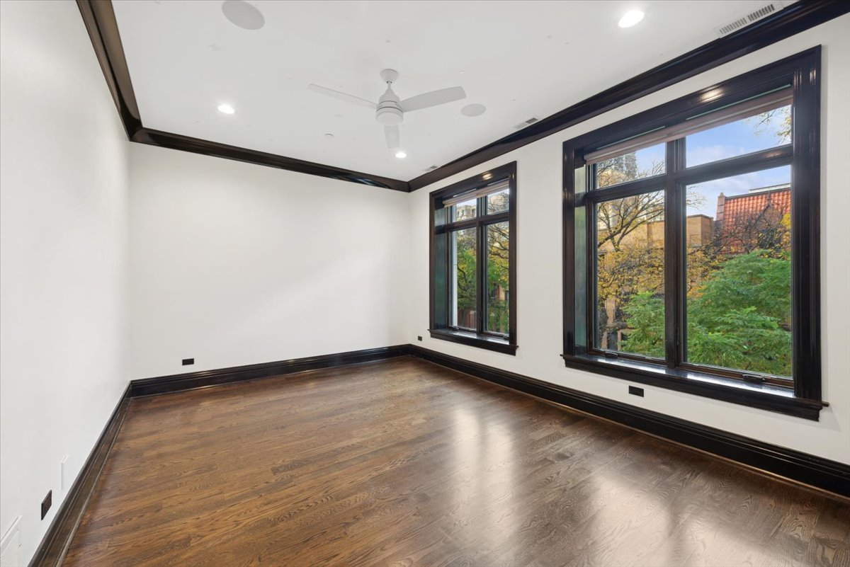 457 West Deming Place Chicago, IL 60614 - Photo 20 of 63 a view of room with window and hardwood floor