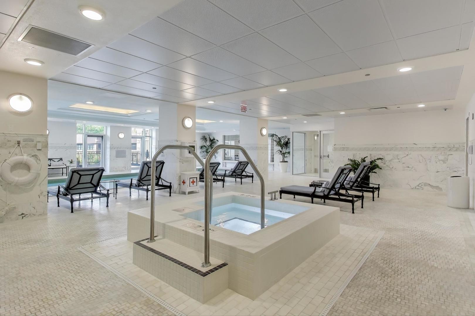 457 West Deming Place Chicago, IL 60614 - Photo 46 of 63 a view of a room with gym equipment and a table