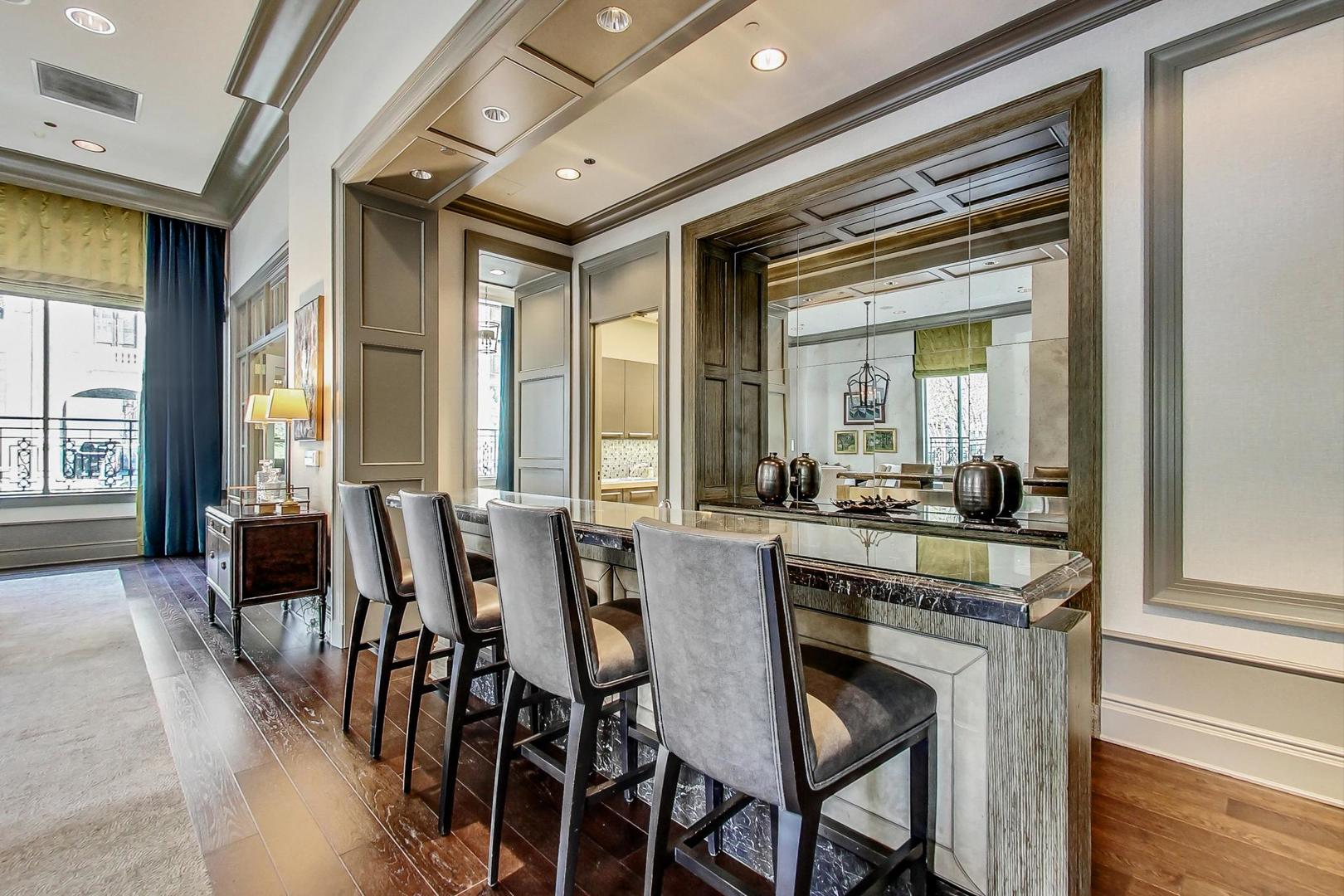 457 West Deming Place Chicago, IL 60614 - Photo 55 of 63 a view of a dining room with furniture wooden floor and chandelier
