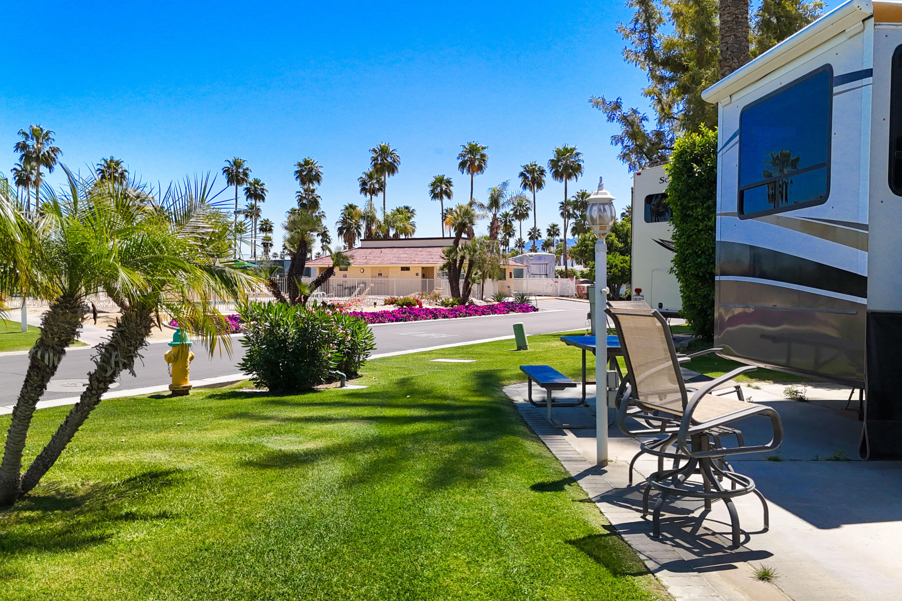 69411 Ramon Road, Unit 504 Cathedral City, CA 92234 - Photo 12 of 56 a view of a backyard with a patio