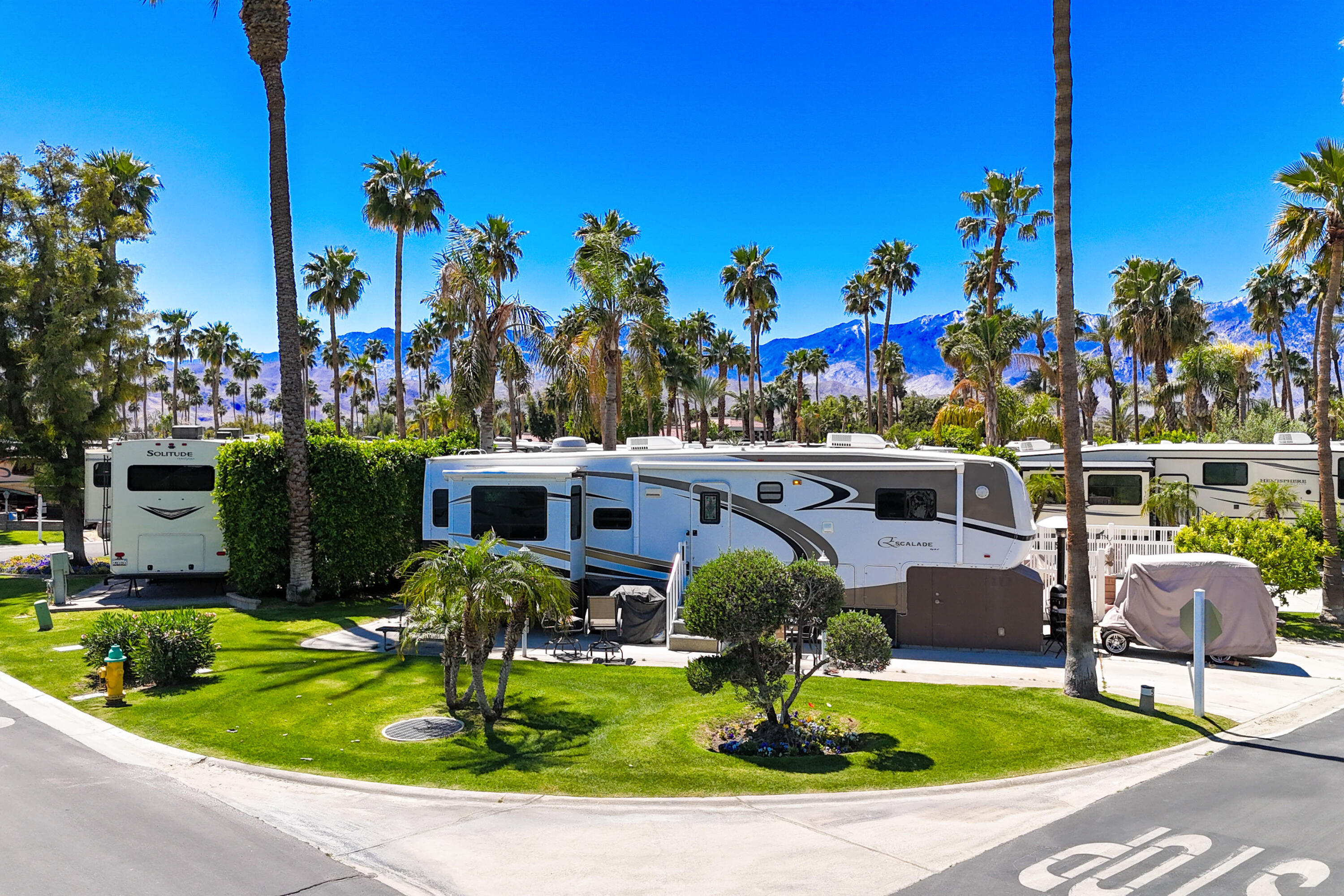 69411 Ramon Road, Unit 504 Cathedral City, CA 92234 - Photo 3 of 56 a view of a house with swimming pool outdoor seating