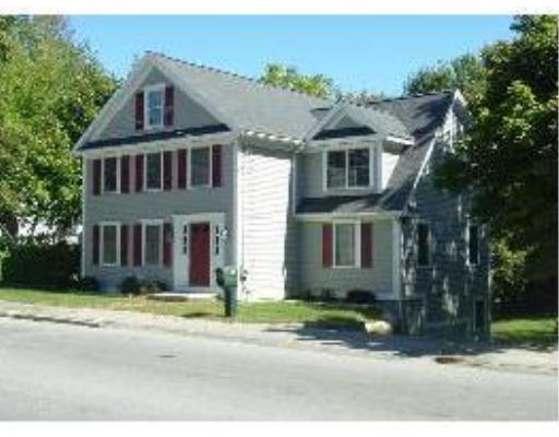 30 Concord Road Billerica, MA 01821 - Photo 1 of 10 a front view of a house with a yard