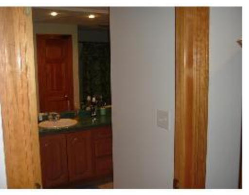 30 Concord Road Billerica, MA 01821 - Photo 6 of 10 a bathroom with a sink and mirror