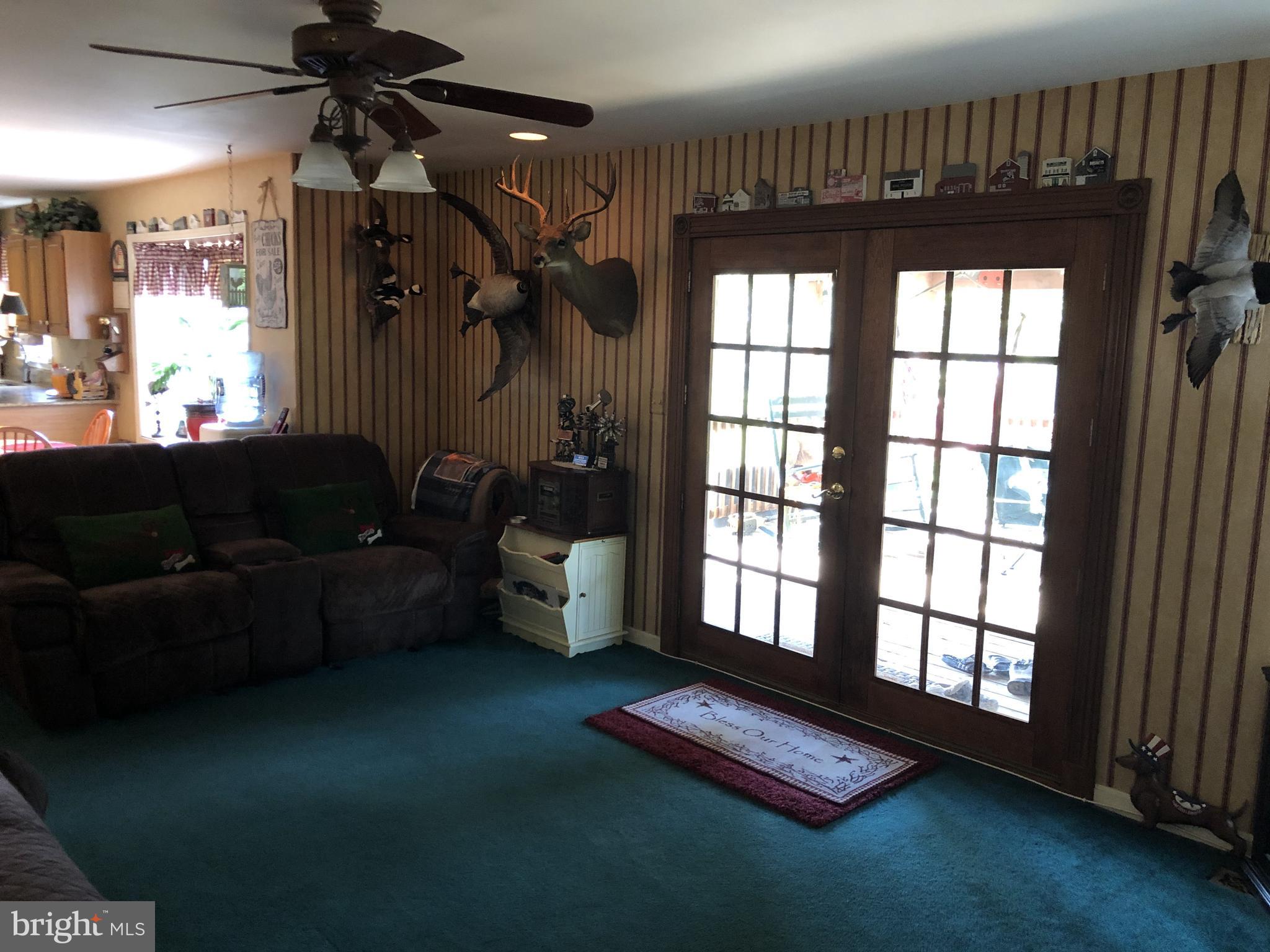 1380 Old Water Oak Point Road Pasadena, MD 21122 - Photo 19 of 41 Doors leading to Screened Porch