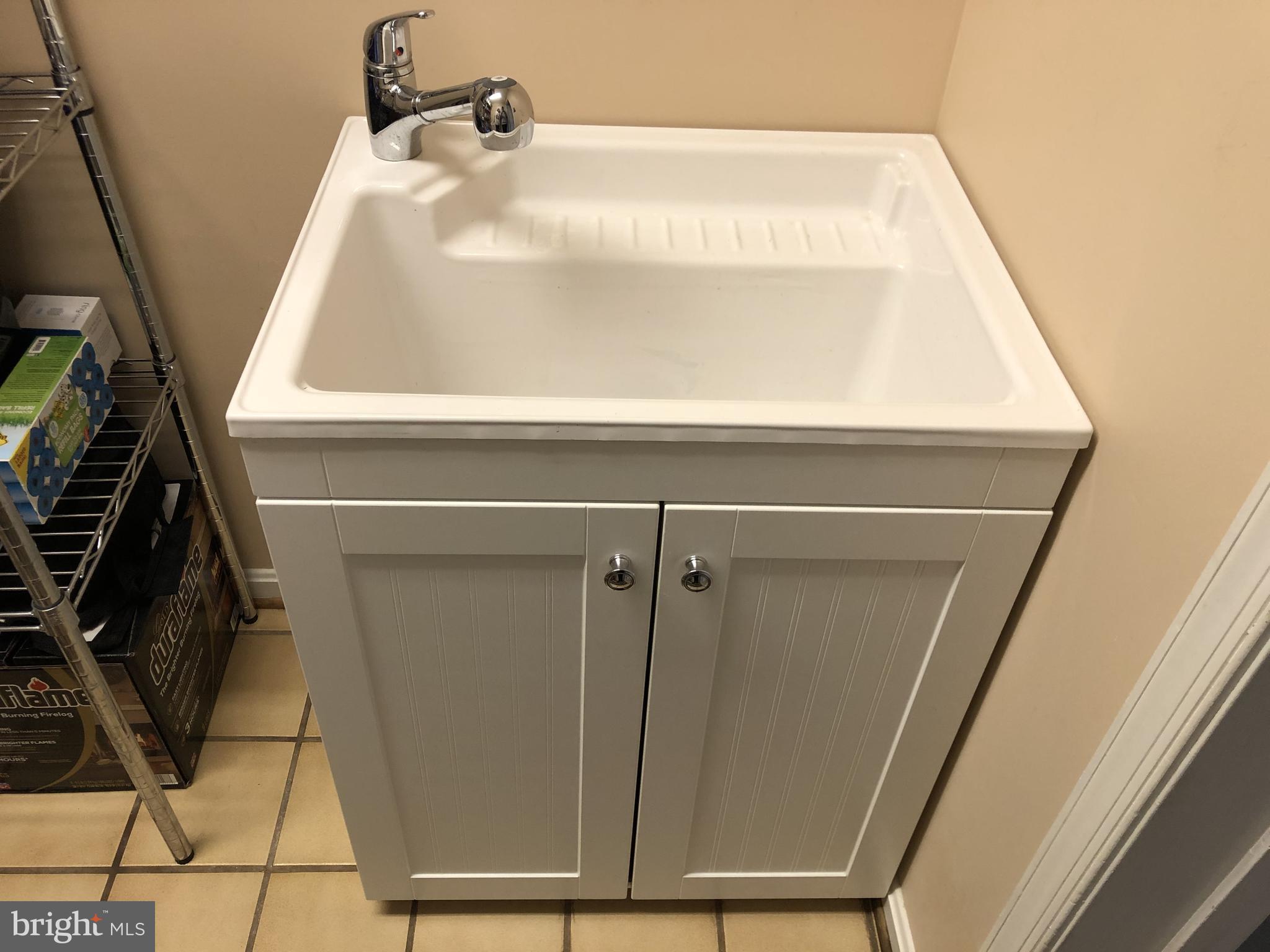 1380 Old Water Oak Point Road Pasadena, MD 21122 - Photo 32 of 41 Washtub in Pantry