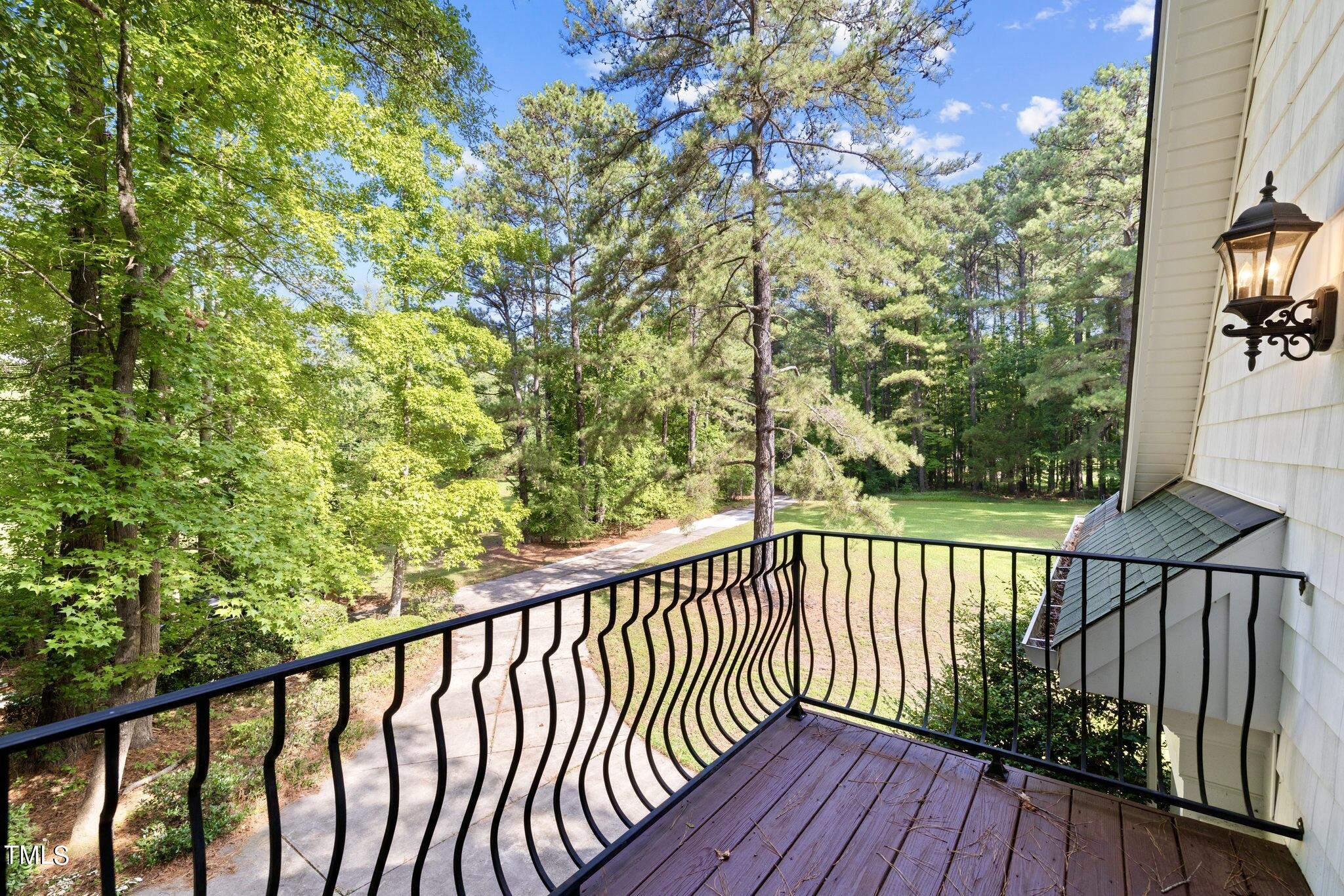4099 Blackard Pond Road Raleigh, NC 27604 - Photo 17 of 94 a view of a balcony with wooden floor