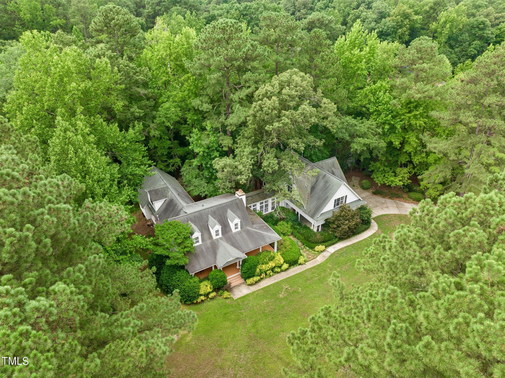 4099 Blackard Pond Road Raleigh, NC 27604 - Photo 2 of 94 an aerial view of residential house with outdoor space and trees all around