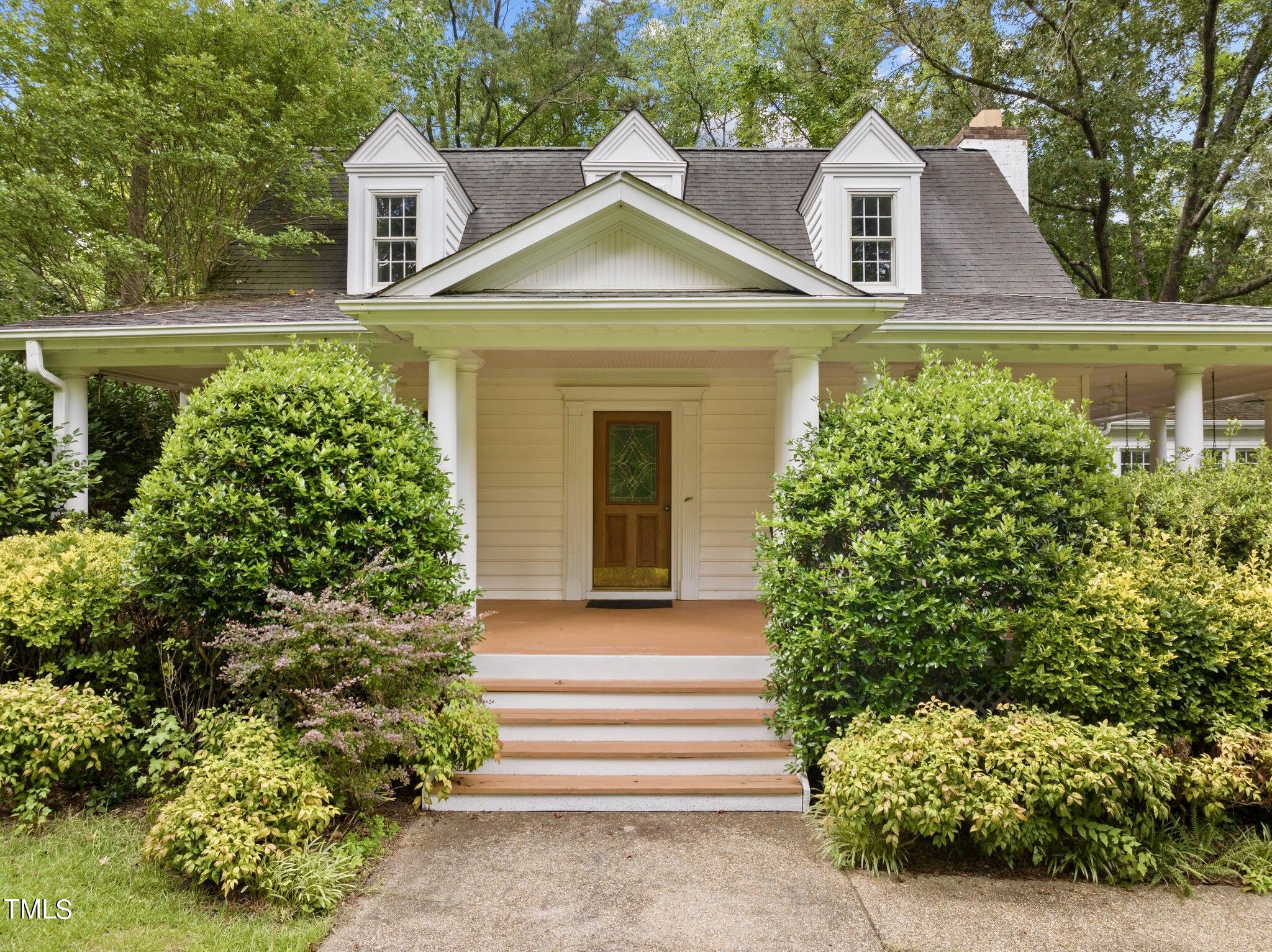 4099 Blackard Pond Road Raleigh, NC 27604 - Photo 21 of 94 a front view of a house with a yard