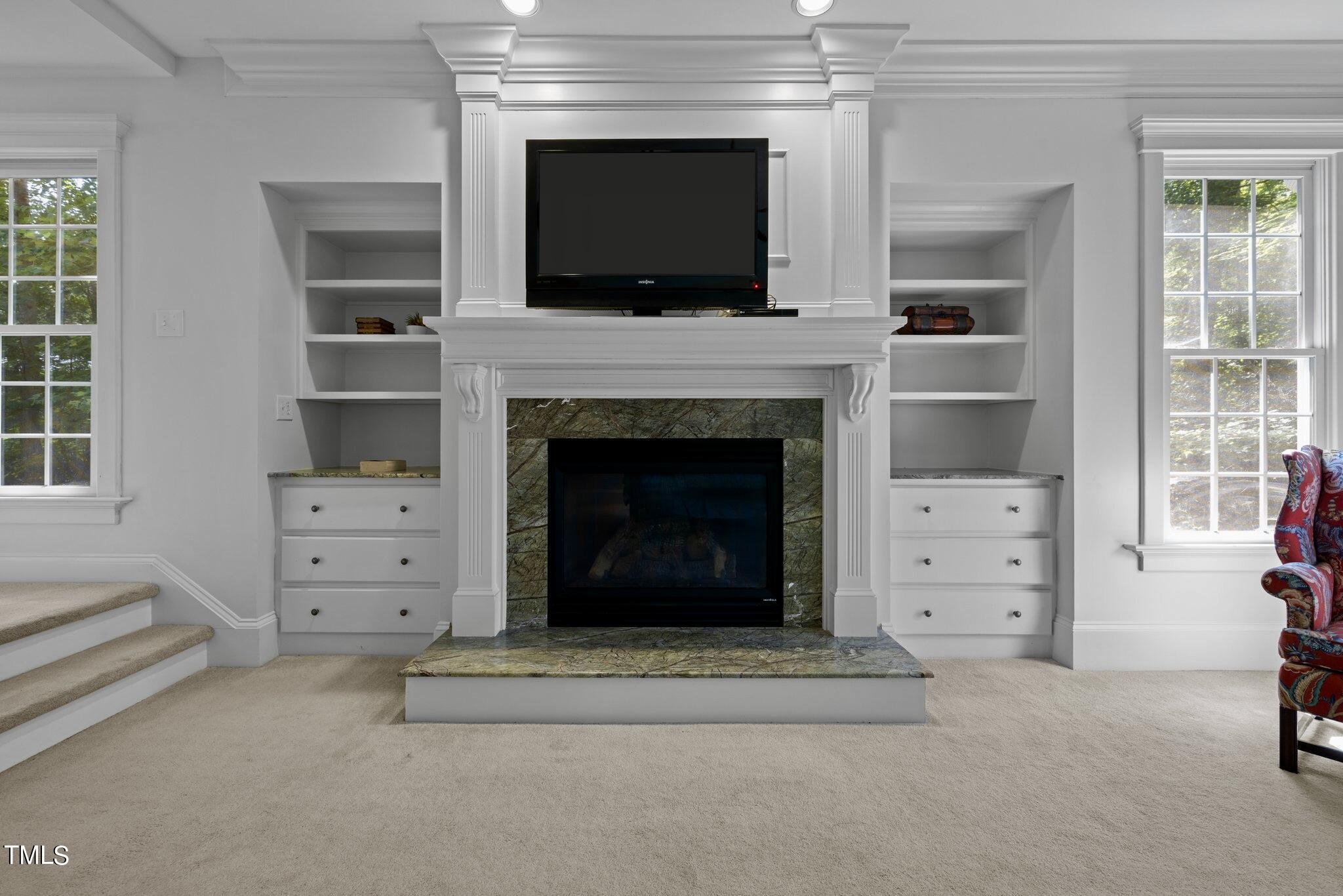 4099 Blackard Pond Road Raleigh, NC 27604 - Photo 40 of 94 a living room with furniture and a fireplace