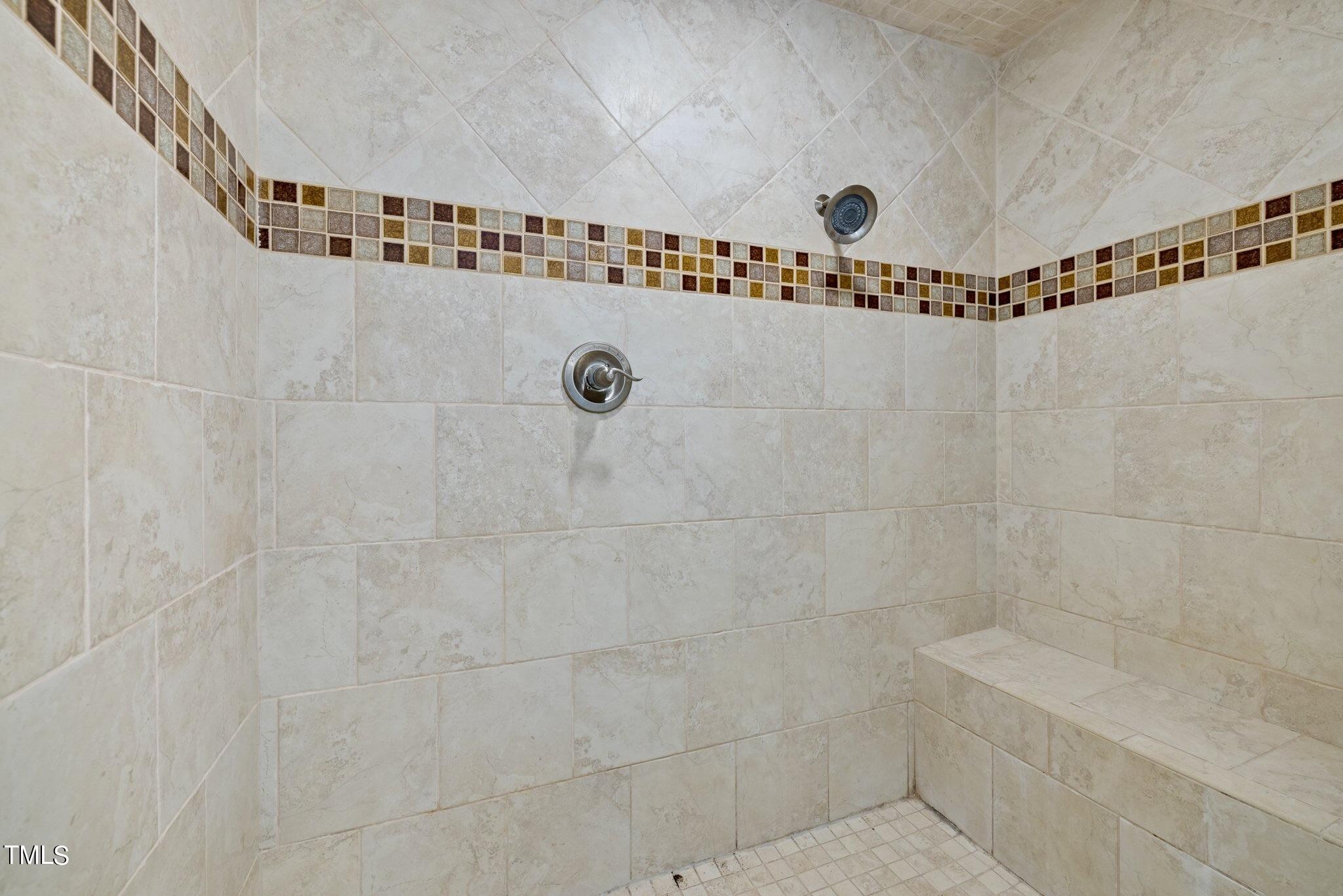 4099 Blackard Pond Road Raleigh, NC 27604 - Photo 46 of 94 a bathroom with a shower and a bathtub