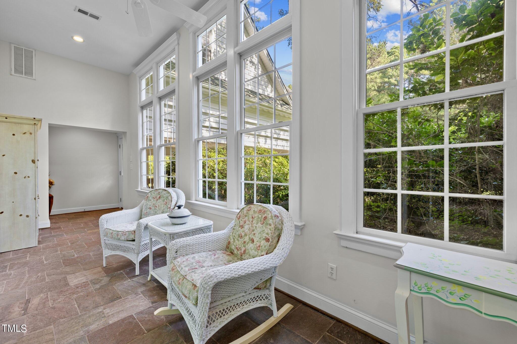 4099 Blackard Pond Road Raleigh, NC 27604 - Photo 51 of 94 a living room with furniture and a large window