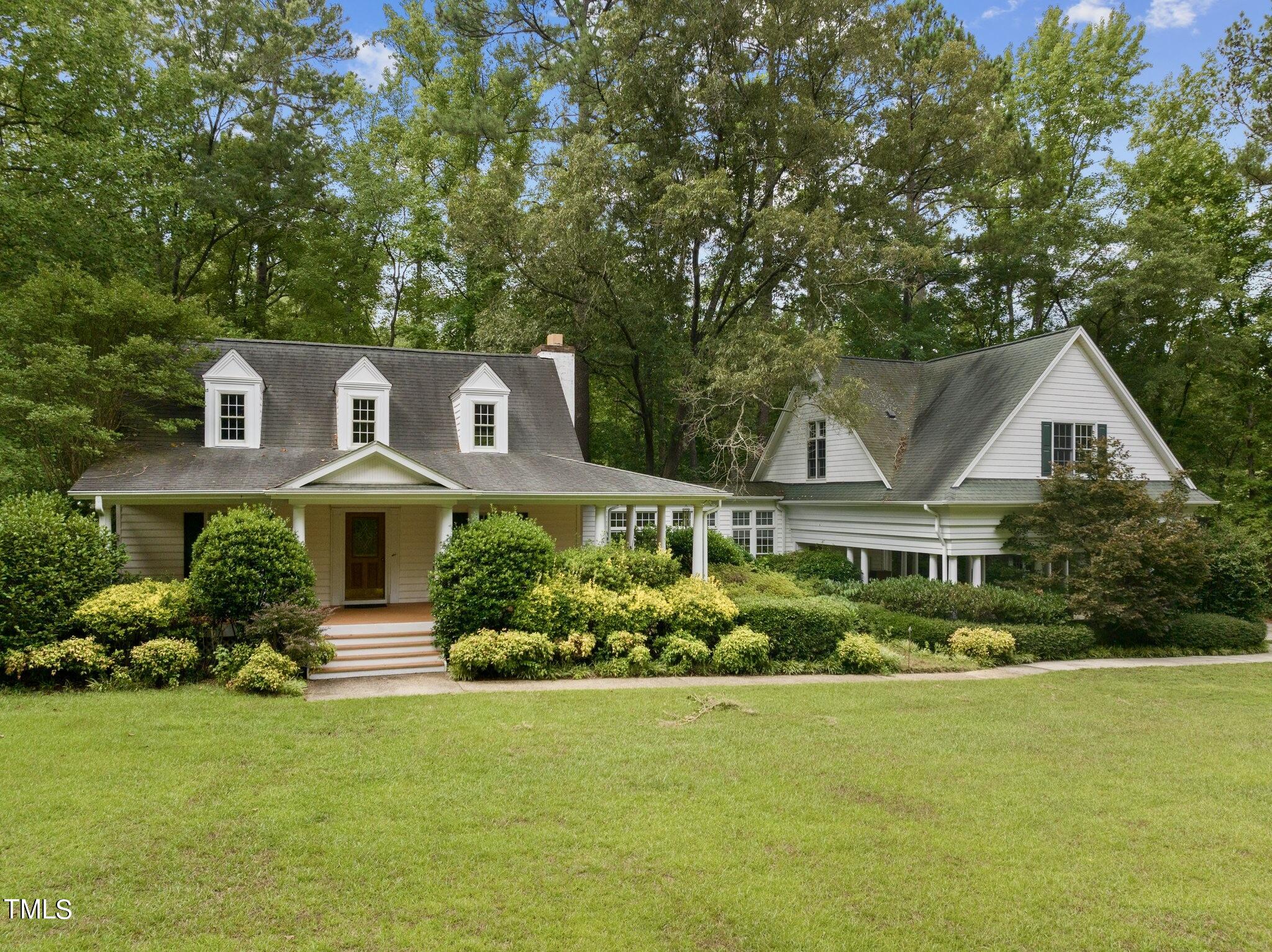 4099 Blackard Pond Road Raleigh, NC 27604 - Photo 6 of 94 a front view of house with yard and green space
