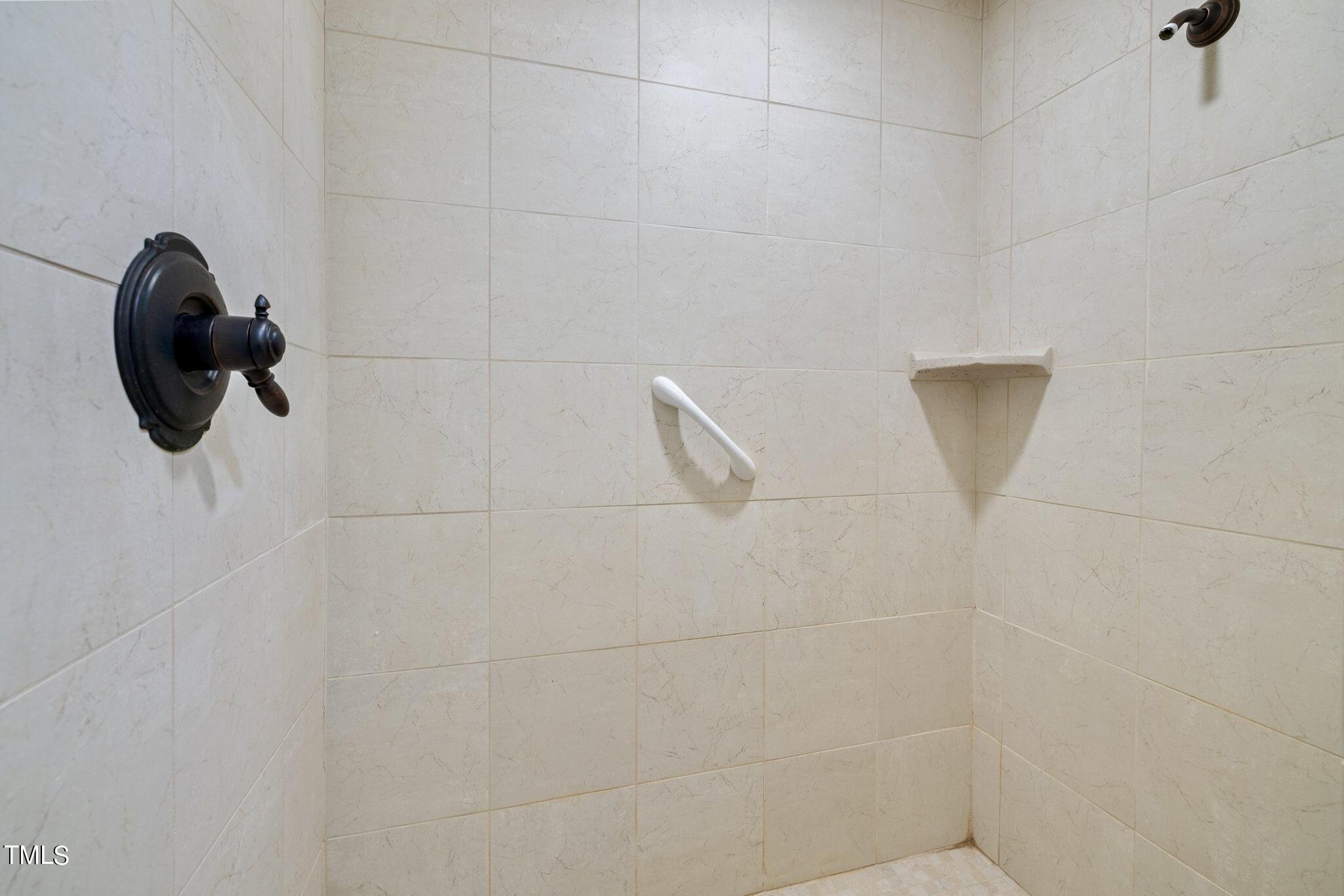 4099 Blackard Pond Road Raleigh, NC 27604 - Photo 61 of 94 a bathroom with a shower