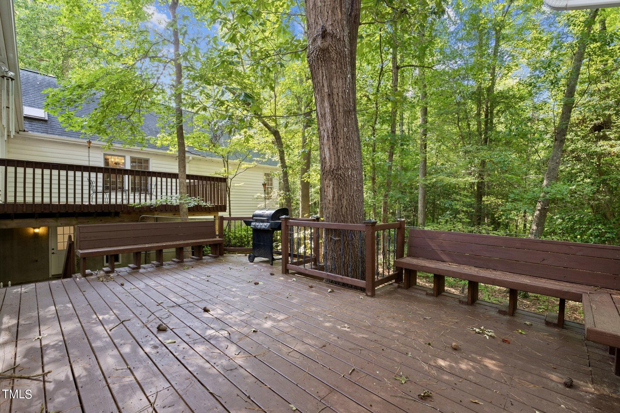 4099 Blackard Pond Road Raleigh, NC 27604 - Photo 85 of 94 a view of a deck with table and chairs a barbeque with wooden floor and fence