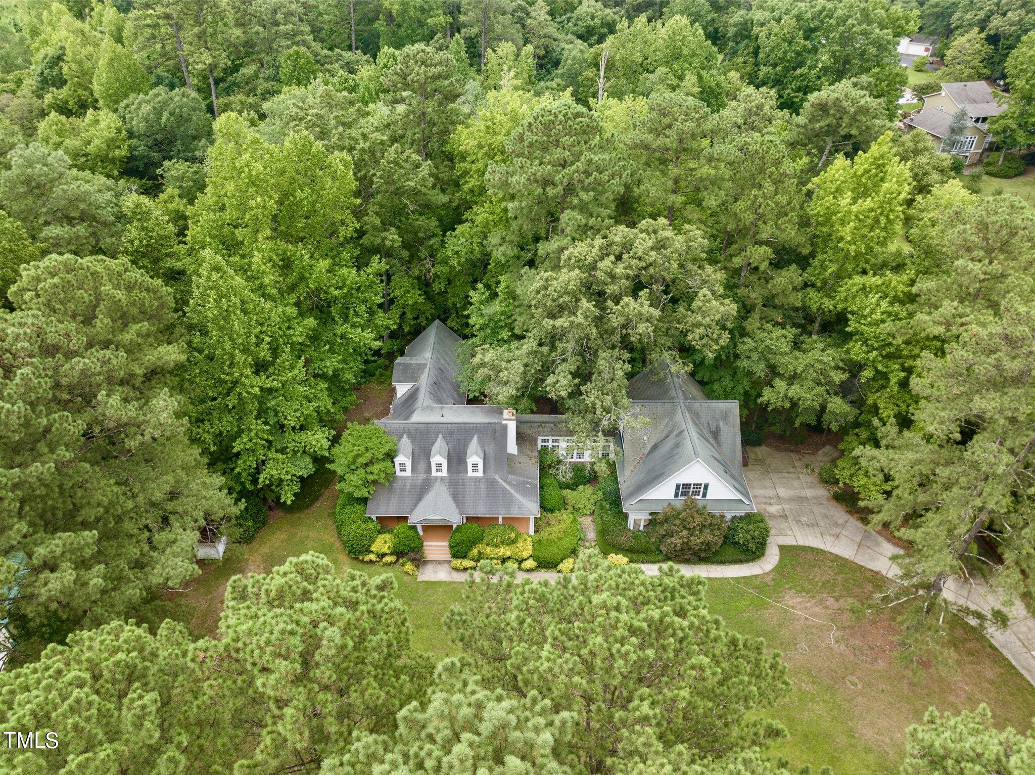 4099 Blackard Pond Road Raleigh, NC 27604 - Photo 92 of 94 an aerial view of a house with yard swimming pool and outdoor seating