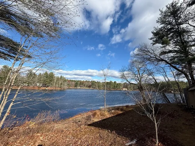 a view of a backyard of the house